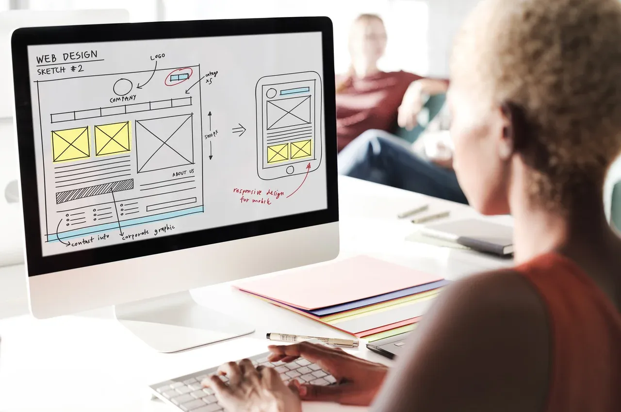 Designer working on a website in a browser
