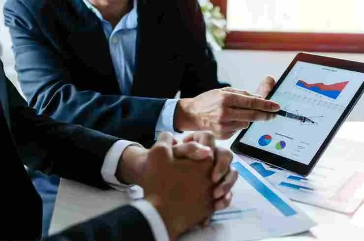 Consultants reviewing a product with a client