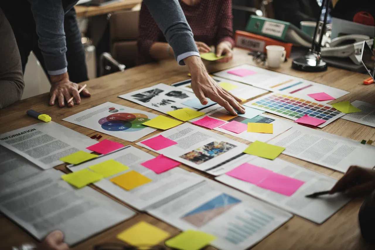 Business people brainstorming around a table